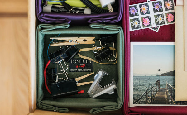 Close-up of Tray Biens organizing what would usually be in a "junk drawer"